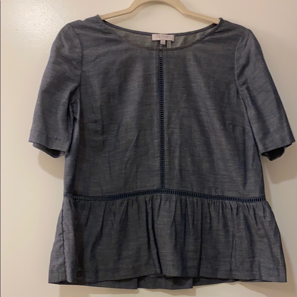 Short sleeved navy blue top with tiny squares
